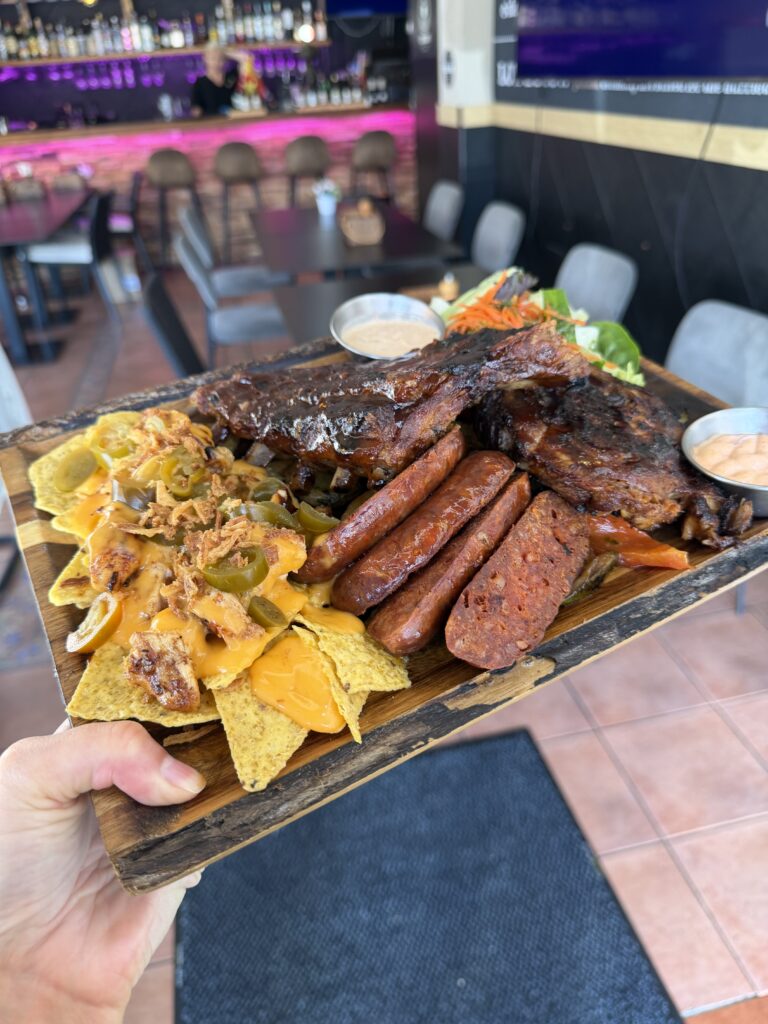 Club Room 1 meat platter with ribs, sausages and nachos
