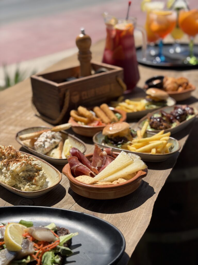 A selection of Club Room 1 dishes on the terrace