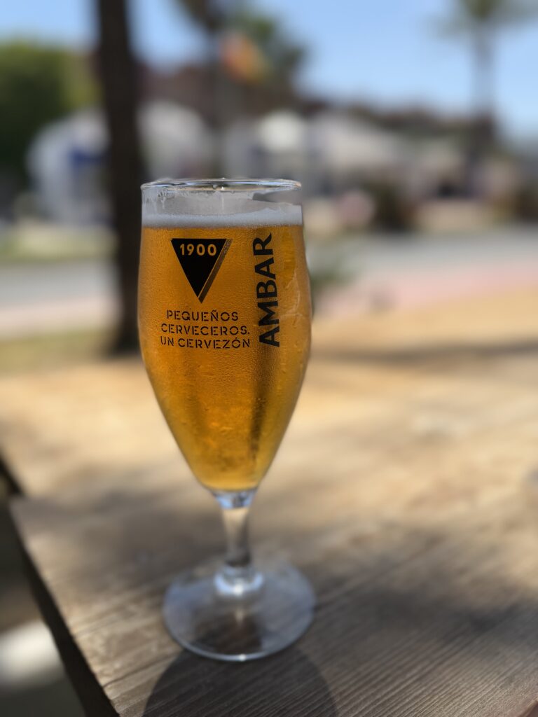 Cold beer on the sunny Club Room 1 terrace